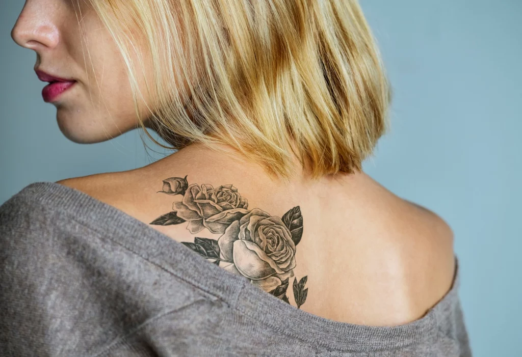 Woman with Tattoo due to receive laser hair removal